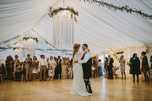 Newlyweds sharing first dance at Harvest Moon Weddings