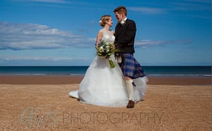Couple married on the beach at Harvest Moon