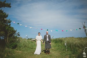 Bride and groom at farm wedding Scotland