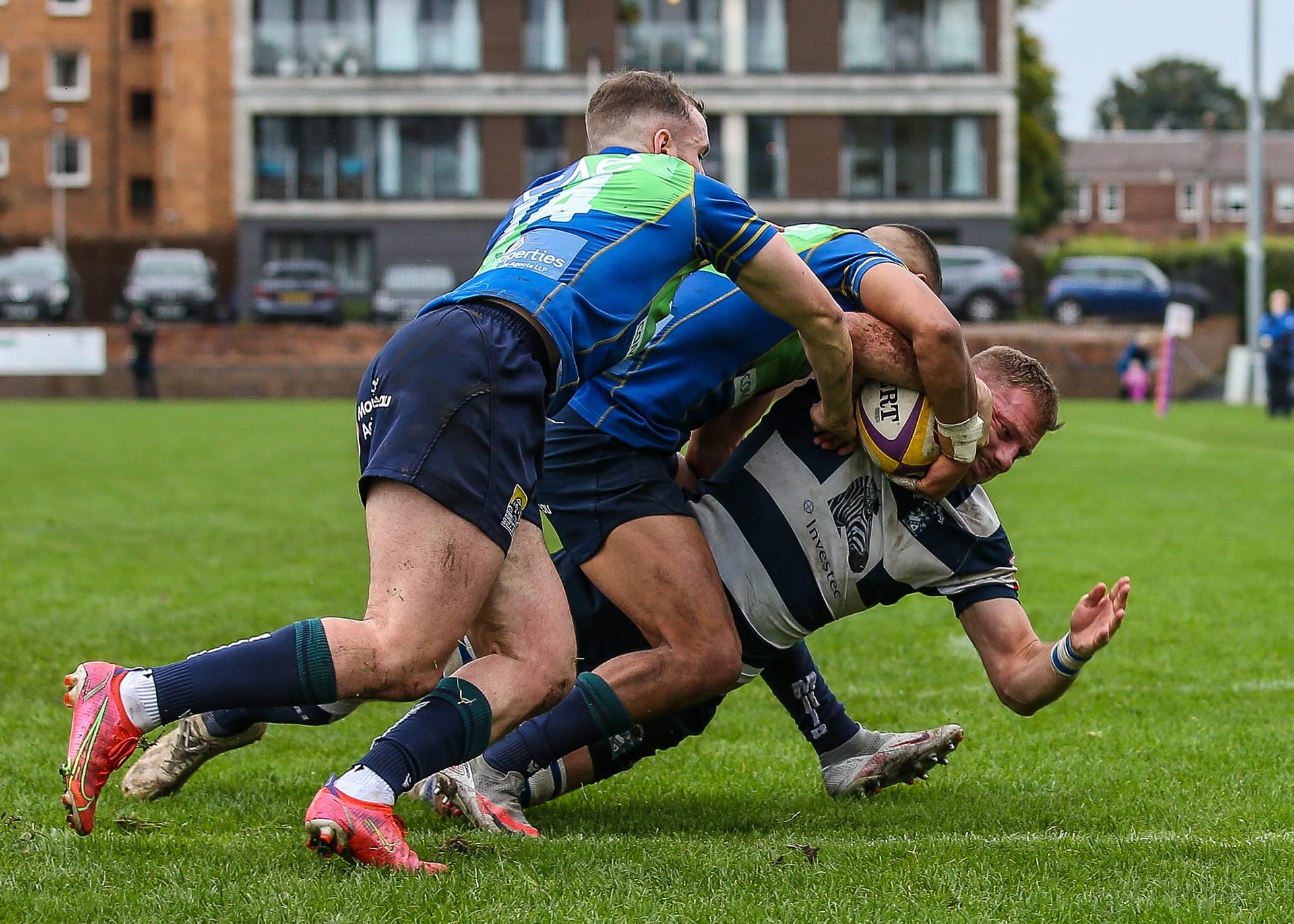 Boroughmuirs Kaleem Barreto and Callum Ramm tackle Heriots Captain Iain Wilson just short of the try line .FOSROC Super 6 match between Heriot's Rugby and Boroughmuir Bears at Goldenacre, Edinburgh on 09/10/2021. 

(Photo: 39 Design Photography)
